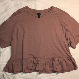 Cropped pink ruffled blouse